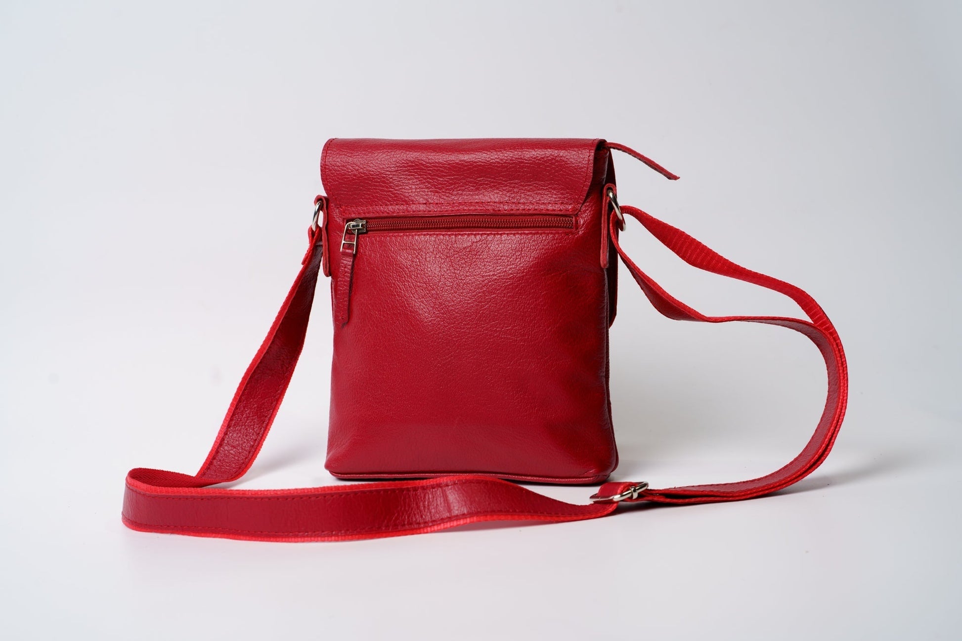 red leather purse shoulder strap